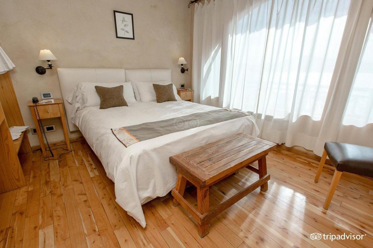 Lirolay Suites - Apart Hotel Сан-Карлос-де-Барилоче Экстерьер фото